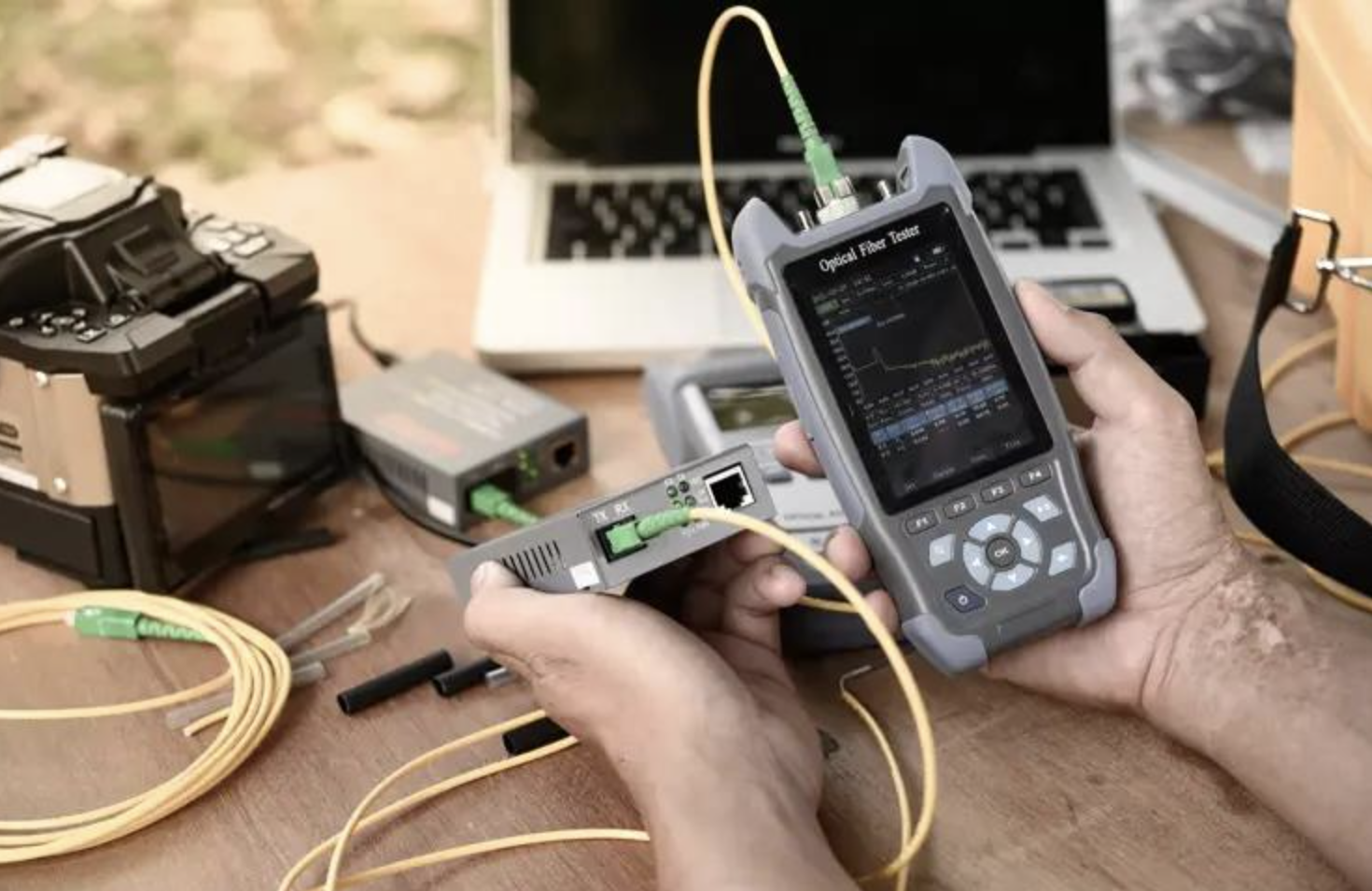 Fiber splicing and OTDR testing on a field workbench